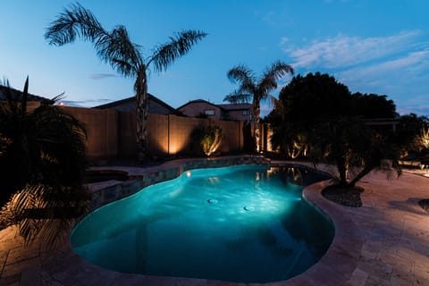 Back yard and pool lit up at night is breath taking!