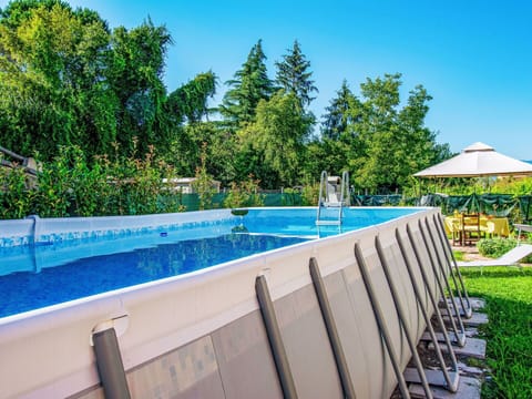 Water, Plant, Sky, Swimming Pool, Azure, Shade, Tree, Eco Hotel, Outdoor Furniture, Leisure