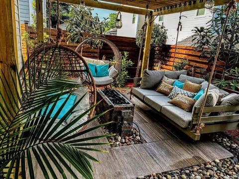 Outdoor Day bed, egg chairs, and firepit