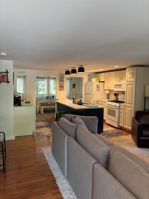 Open concept with living room, kitchen & dining area