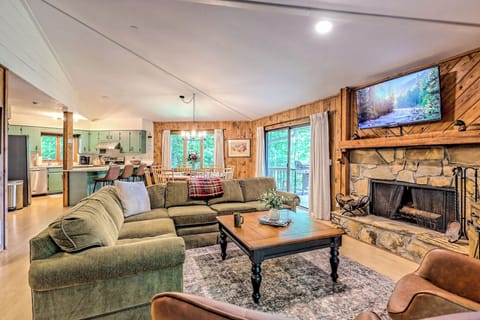 This open concept living room, dining room and kitchen is perfect for families