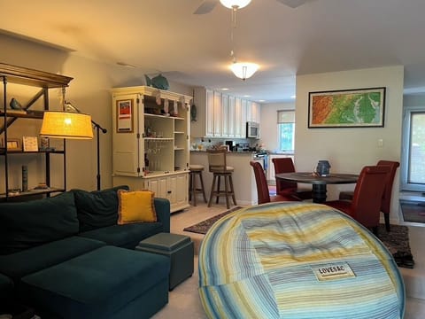 View of living room, dining area, and kitchen 