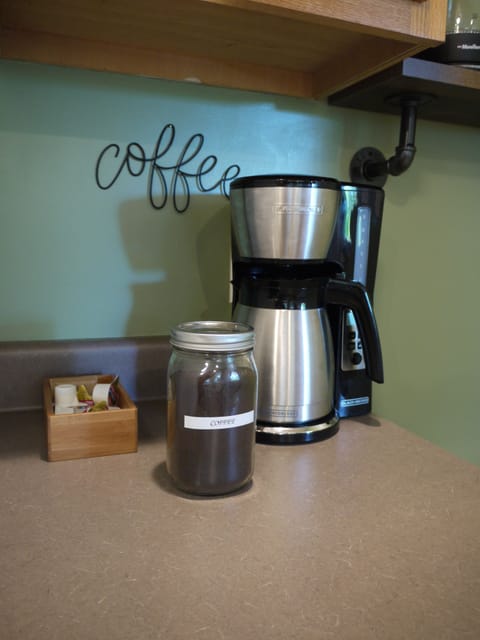 Coffee, creamers, coffee maker, and french press