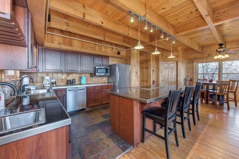 Sip morning coffee or grab a bite at the kitchen counter, with seating for 3