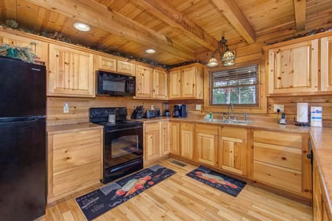 Enter the inviting kitchen, offering ample space & all the comforts of home