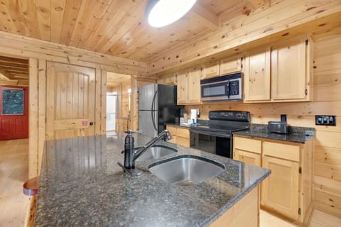 The kitchen offers loads of space & all the comforts of home