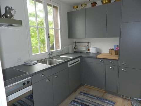 New kitchen with microwave, Nespresso machine and new dishes
