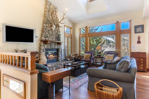 Spacious Living Room with Wood Burning Fireplace and Views of Beaver Creek Mountains!
