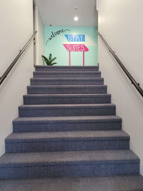 Up the stairs and down the hall to Haywards Bay Suite. 