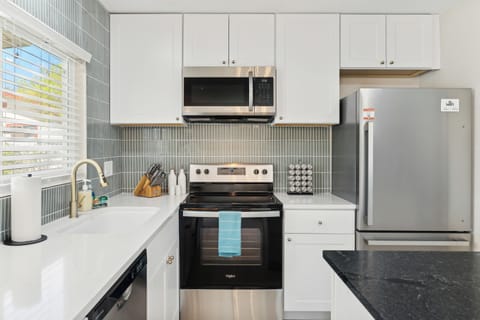 Cook meals in this fully stocked kitchen remodeled top to bottom in 2024!