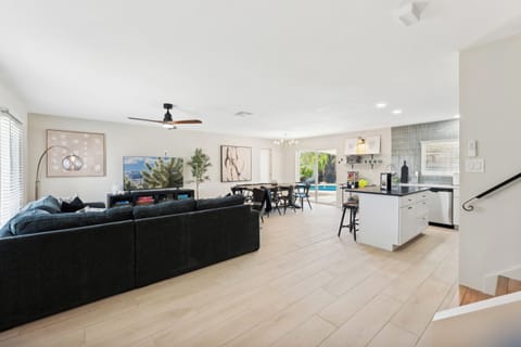 View of the open concept main living area from the front door entrance.
