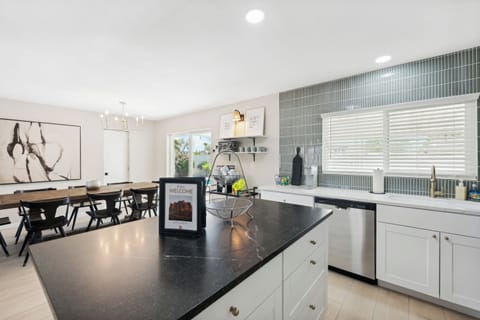 Another view of the kitchen looking toward the back yard sliding doors.