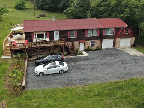 Fabulous country lodge on over an acre with multiple parking spaces.