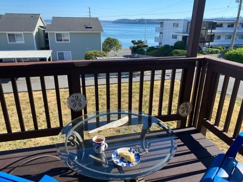 That scone could also be a cookie to have with that coffee and not a bad view either!