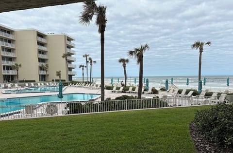 View from Condo Looking at Two Large Pools (One Heated) & Direct Access to Ocean