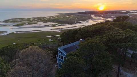 Watch the sunset over the scenic marshlands, a perfect way to end the day from the comfort of your home.