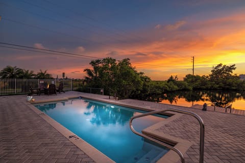 Evening swims under a painted sky