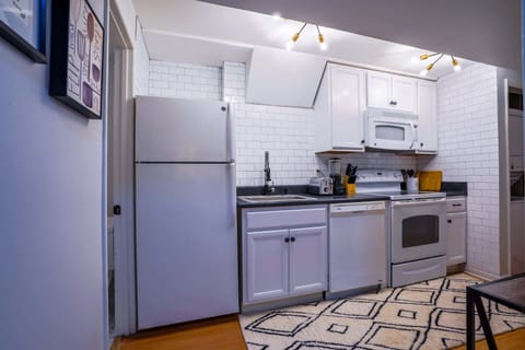 Kitchen with Keurig, blender, toaster, electric stove top and more