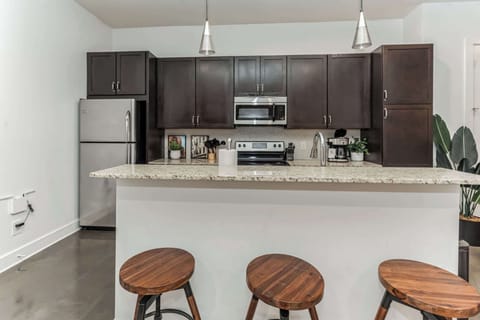 Sip morning coffee or grab a bite at the kitchen counter, seating 3