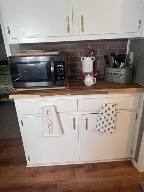 Microwave oven crockpot, water, pitchers bowls