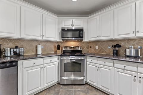 Fully Equipped: Modern appliances and everything you need to cook at home.