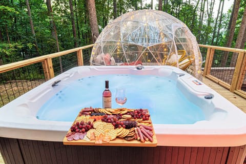 Hot tub (fits 6) and geodome aera on the lower deck.