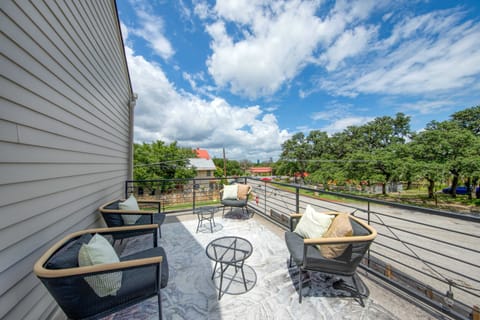 Upstairs deck with BBQ and patio seating