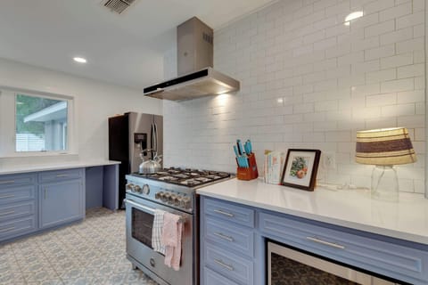 The kitchen is a chef’s dream, offering endless space & top-tier appliances