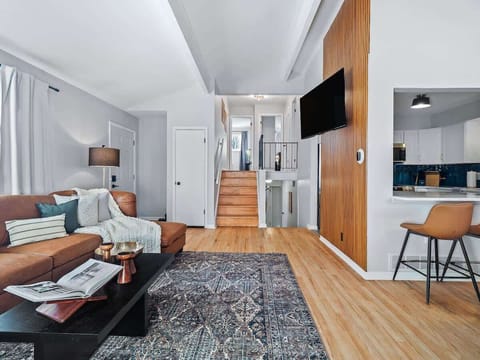 A warm and inviting atmosphere.  The natural light and neutral tones create a tranquil space.