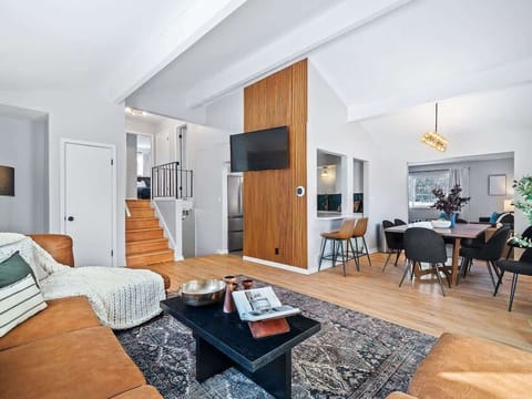 Sunbeams streaming in, highlighting the beautiful rug and comfy sectional.  Pure bliss. 