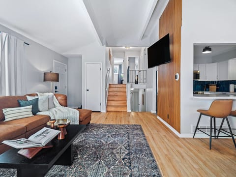 A warm and inviting atmosphere. The natural light and neutral tones create a tranquil space.