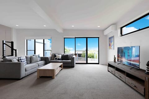🏡 Downstairs living space with open layout and TV