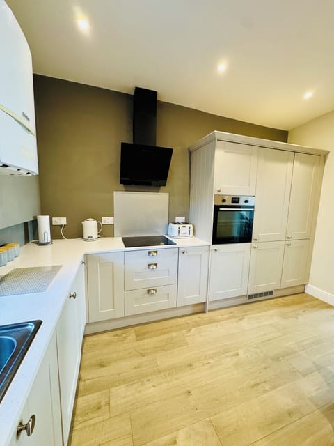 Kitchen / Diner with Washer/Dryer, Dishwasher, Microwave, Oven and Tall Fridge Freezer (1)