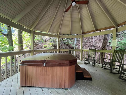 Bask in bubbling bliss in your very own private, covered hot tub!