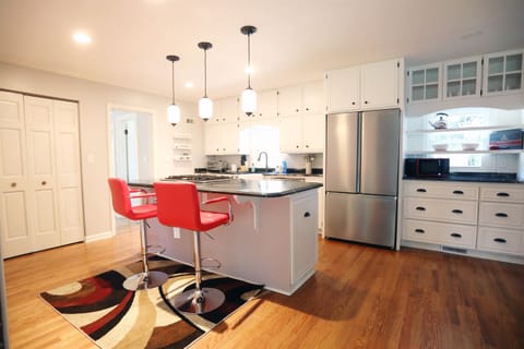 Kitchen perspective from family room behind