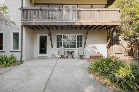 Back yard with outdoor furniture.