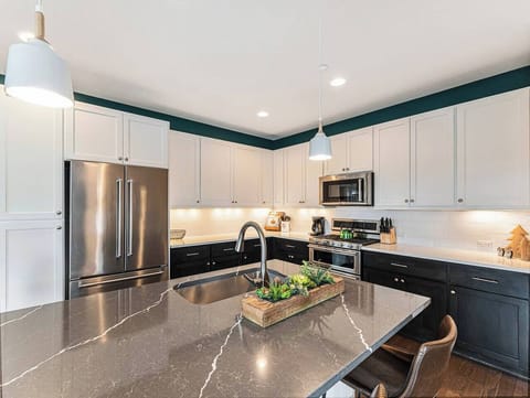 The large, luxury kitchen is outfitted with 2 ovens, a microwave, and all the equipment and accessories needed for the gourmet cook looking to entertain!