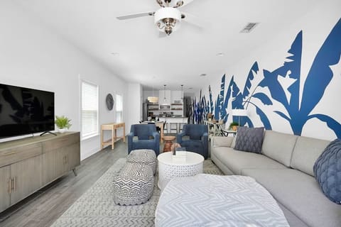 Large open Living Room for everyone to lounge with a hand-painted Mural!!! 