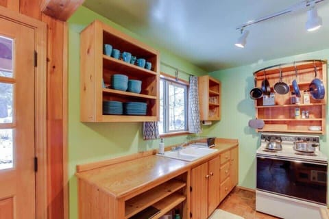 Stocked with place settings, pots, pans, glasses and more.