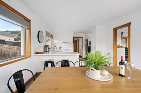 Upstairs dining table with spare chairs.