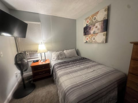 Full size bed in bedroom sleeps sleeps 2