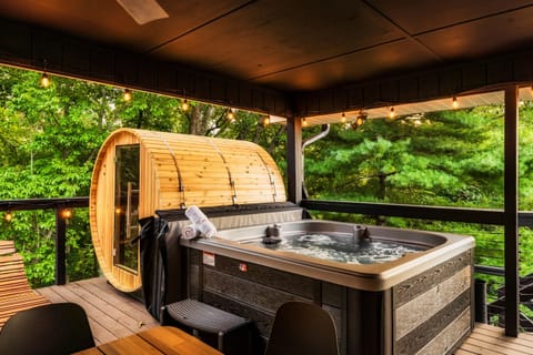 Hop in and out of the sauna and hot tub that are next to each other.