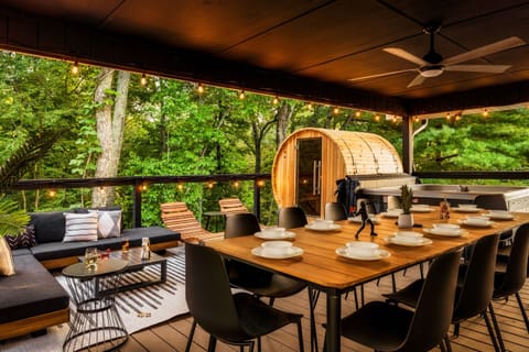 Dine al fresco at this table that seats 12 while your family lounges outside in the hot tub  and sauna or watches the outdoor TV.