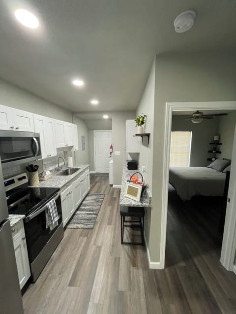 Kitchen with breakfast bar and stools