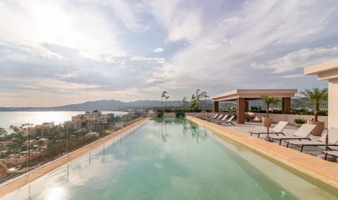 Rooftop Pool Area with Panoramic Ocean Views