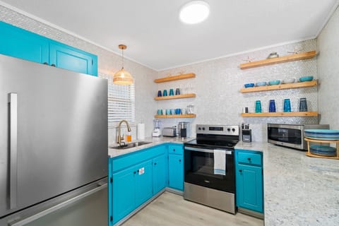 Colorful kitchen with all you will need to make great meals.