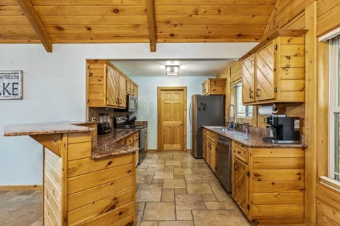 fully stocked kitchen, crock pot, blender, toaster, waffle iron, coffee, bakeware