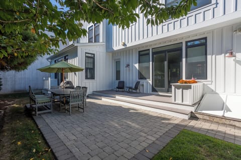 Rear Patio with Seating and Grill
