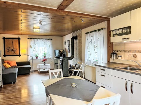 Property, Furniture, Couch, Cabinetry, Interior Design, Architecture, Table, Countertop, Flooring, Chair