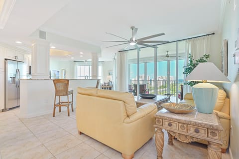DN905 - Living with sliding doors opening up to the screened in balcony with gorgeous gulf view!